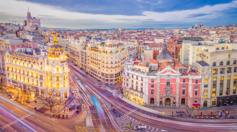 Downtown Madrid, Spain, where the Calle de Alcala meets the Gran Via. These are two of the most famous and busy streets in Madrid.
