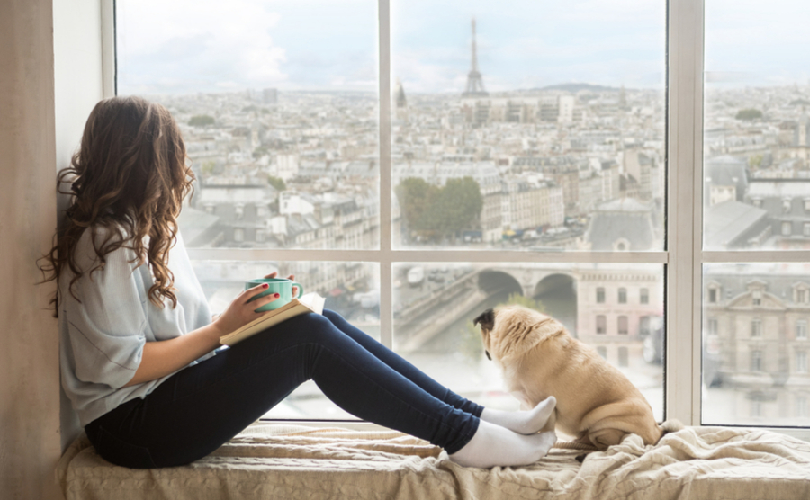 girl with dog in an apartment, Paris 